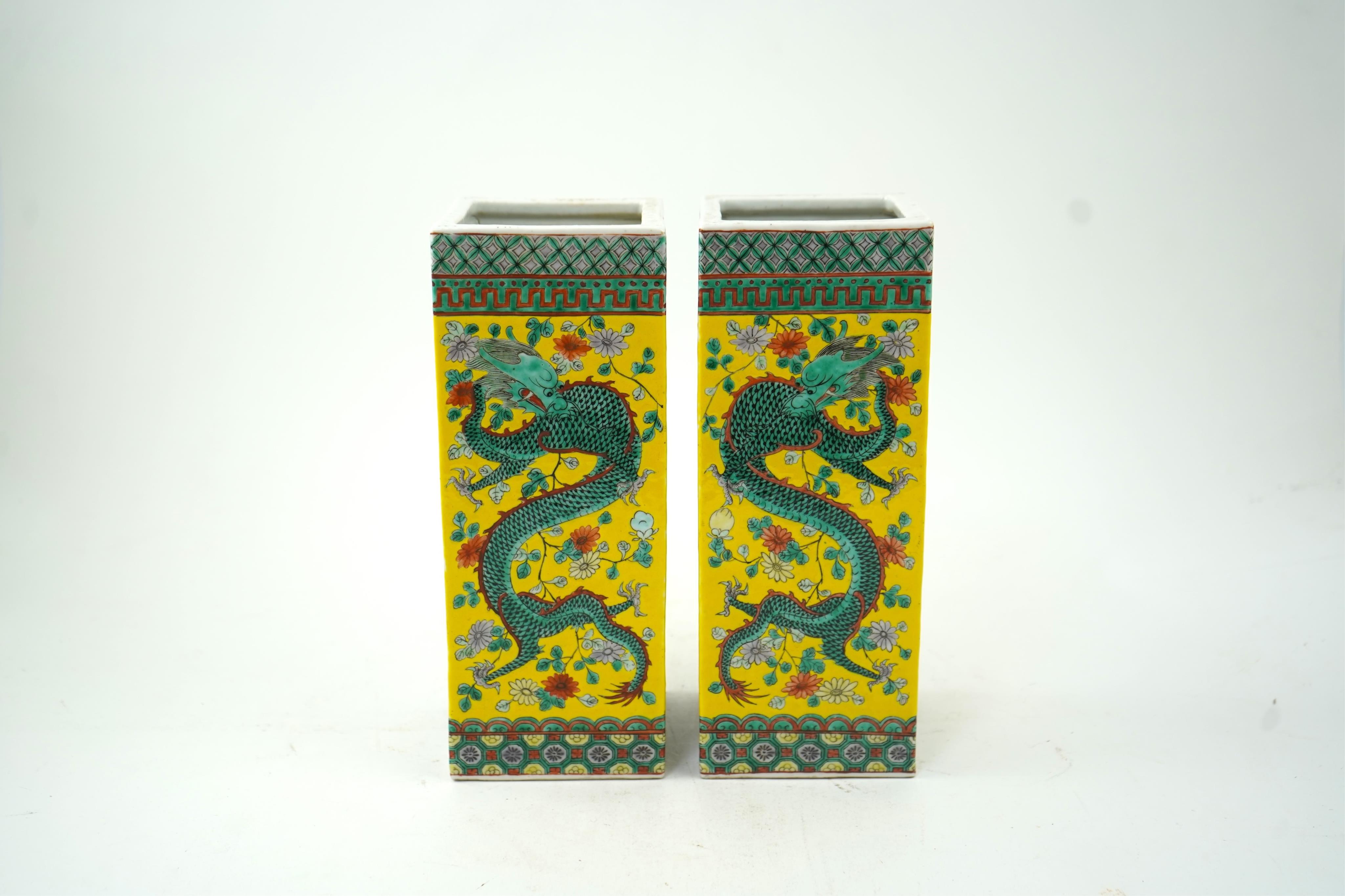 A pair of Chinese yellow ground square vases, late 19th century